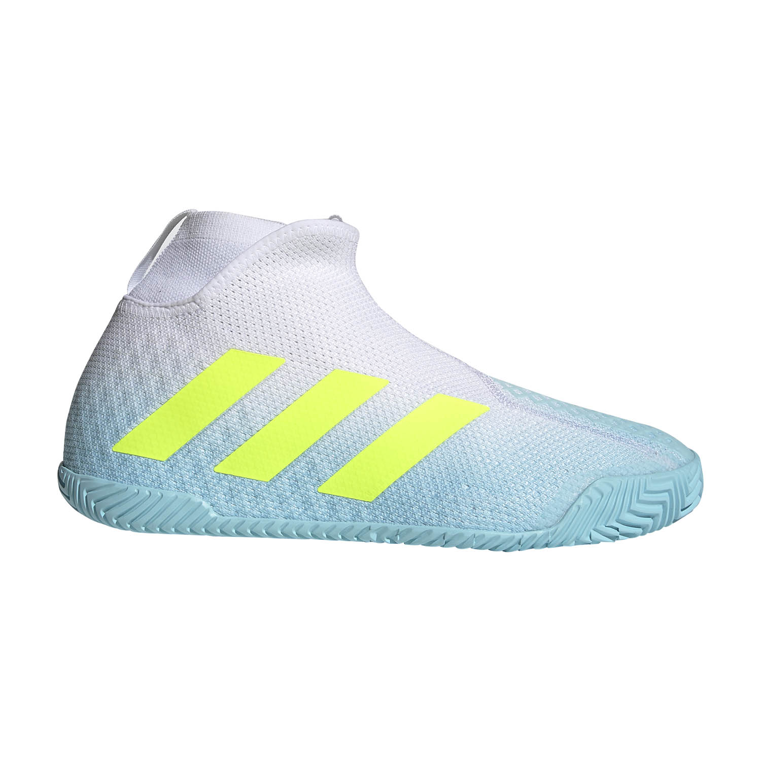 yellow and white tennis shoes