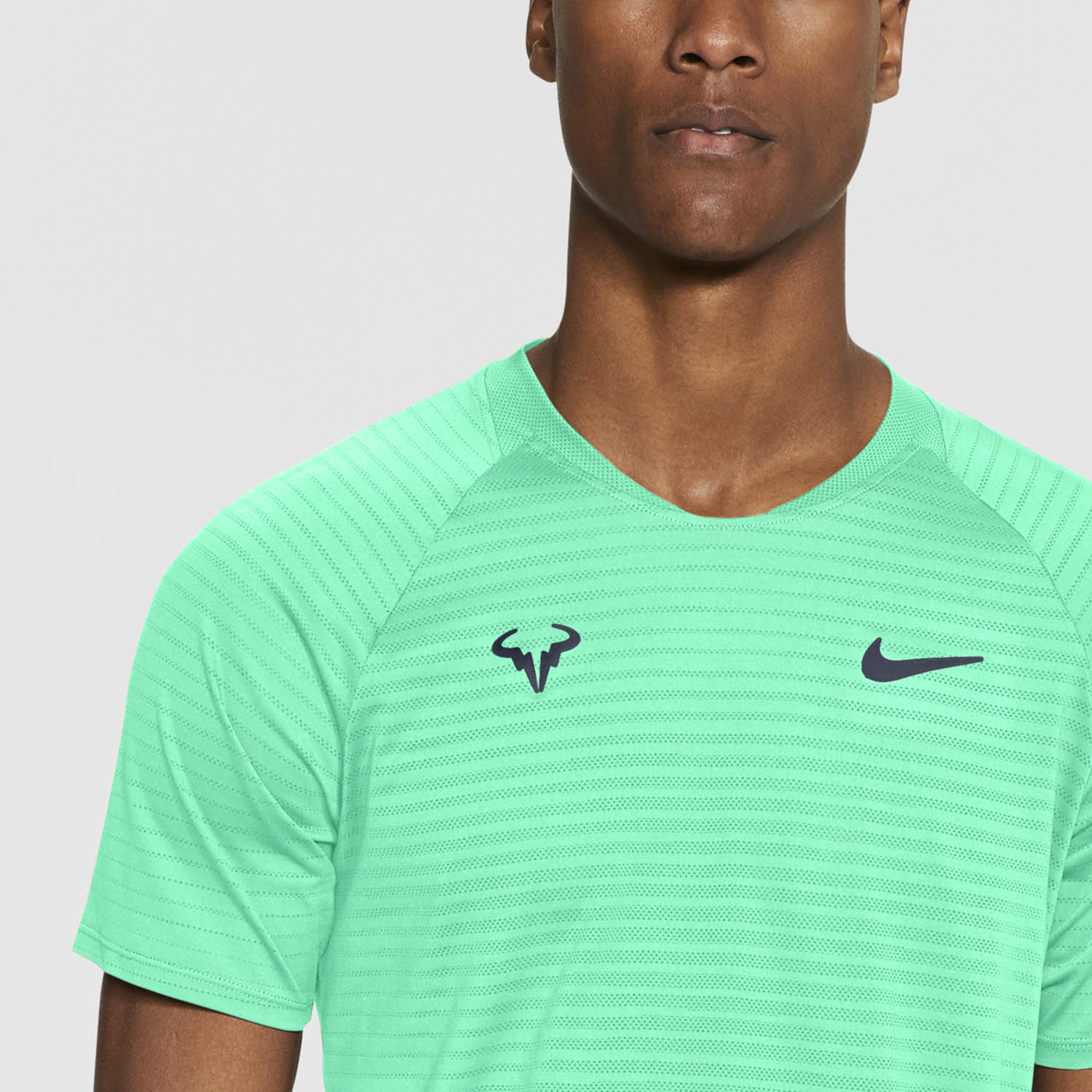 blue green nike shirt