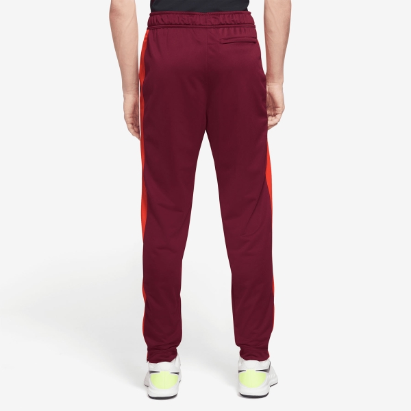 Nike Heritage Men s Tennis Pants Dark Beetroot Habanero Red