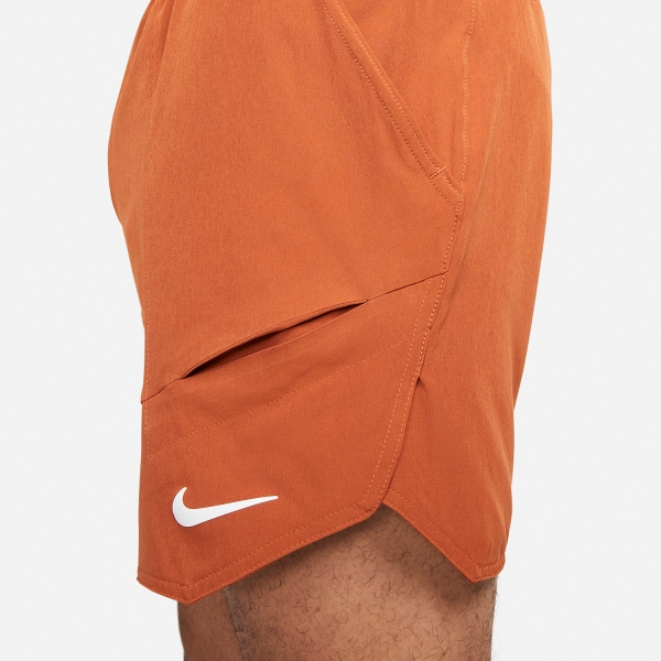 Orange and sale black nike shorts