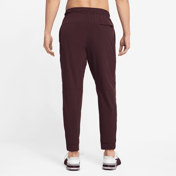 Nike Unlimited Pantaloni - Burgundy Crush/Black