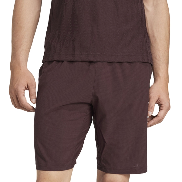 Pantaloncini Tennis Uomo adidas Ergo 7in Pantaloncini  Aurora Ruby JN1342